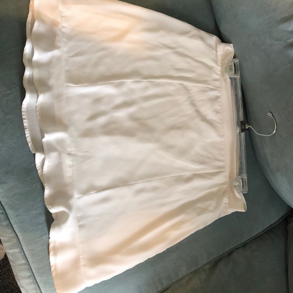 Cute knee length white skirt.